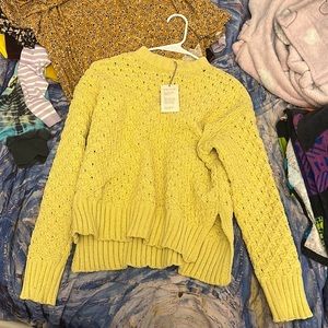 New light yellow sweater crocheted soft pretty has tags great condition basic